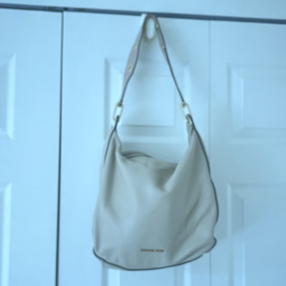 Michael Kors tan guitar strap tote. Non-smoker and non-smoking household.